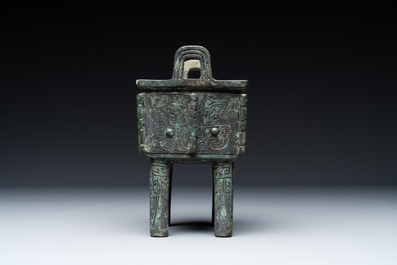 A Chinese rectangular bronze food vessel, 'fang ding 方鼎', Western Zhou