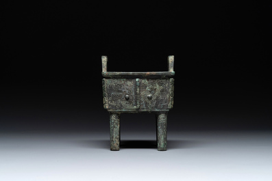 A Chinese rectangular bronze food vessel, 'fang ding 方鼎', Western Zhou