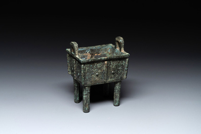 A Chinese rectangular bronze food vessel, 'fang ding 方鼎', Western Zhou