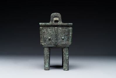 A Chinese rectangular bronze food vessel, 'fang ding 方鼎', Western Zhou