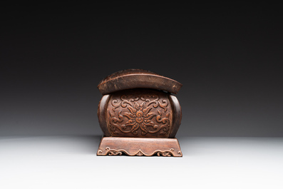 A Chinese Huanghuali wood coffin-shaped offering box and cover with mountainous landscape design, 17/18th C.