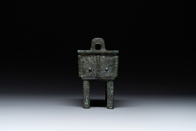 A Chinese rectangular bronze food vessel, 'fang ding 方鼎', Western Zhou