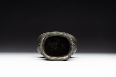 A Chinese silver-inlaid bronze arrow vase with Taotie design, 'touhu 投壺', Ming