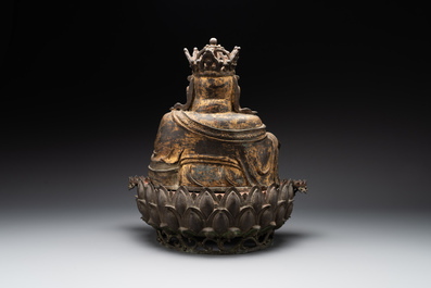 An important and large Chinese gilt bronze Buddha on a lotus throne, Ming