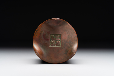 A small Chinese bronze cylindric tripod censer, Xuande mark, Ming