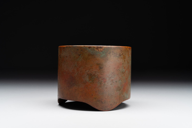 A small Chinese bronze cylindric tripod censer, Xuande mark, Ming