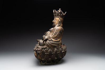 An important and large Chinese gilt bronze Buddha on a lotus throne, Ming