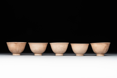 A Japanese blue and white gourd vase, an Imari bottle vase and a set of five Satsuma cups, 19th C.