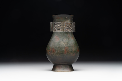 A Chinese silver-inlaid bronze arrow vase with Taotie design, 'touhu 投壺', Ming