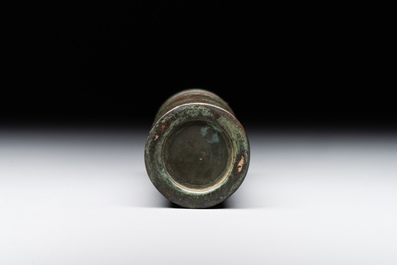 A Chinese bronze cylindrical 'cicada' flower arranging vase, Xuande mark, Ming