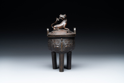 A fine Chinese bronze censer and cover with a Buddhist lion, 'ding 鼎', Xuande Mark, Ming