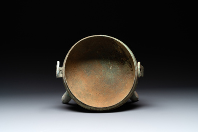 A Chinese archaic bronze tripod food vessel, 'ding 鼎', Eastern Han