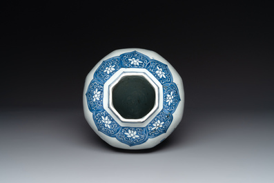A Chinese octagonal blue and white 'birds and flowers' vase, Transitional period