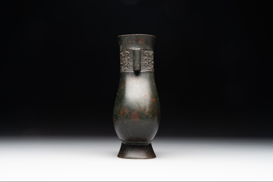 A Chinese silver-inlaid bronze arrow vase with Taotie design, 'touhu 投壺', Ming