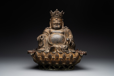 An important and large Chinese gilt bronze Buddha on a lotus throne, Ming
