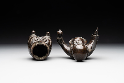 A Chinese bronze vase and a Taoist figure-shaped incense burner, Ming