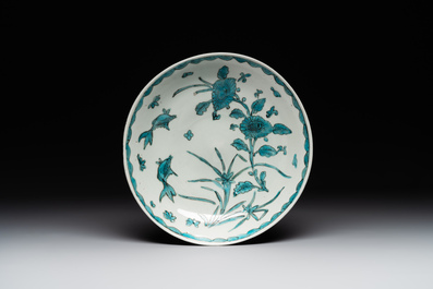 A Chinese Swatow turquoise- and black-enamelled 'carp, narcissus and chrysanthemum' plate and a tomobako, Ming