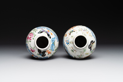 A pair of Chinese Canton famille rose vases and a pair of Dehua blanc de Chine drum-shaped covered jars, 19th C.
