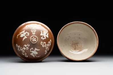 A Chinese slip-decorated brown-glazed 'three friends of winter' bowl and cover, Zhushan kilns, late Ming