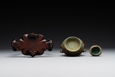 A varied collection of five Chinese bronze objects, 4th C. B.C./15th C.