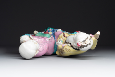 A Chinese famille rose group of Hehe Erxian on wooden stand, Qianlong