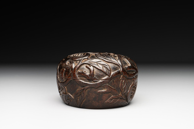 A Chinese huanghuali wooden box and cover with pomegranate design, 17/18th C.