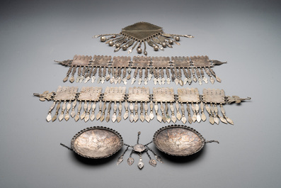 Three silver head ornaments and a chest ornament, Turkmenistan, 19/20th C.