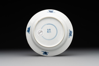 A Chinese blue and white 'Long Eliza and playing boy' cup and saucer, Qi Yu Mei Zhi 奇玉美製 and Bi Yu Tang Zhi 璧玉堂製, Kangxi