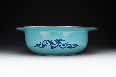 A large Chinese Canton enamel basin with figures in a landscape, Jiaqing