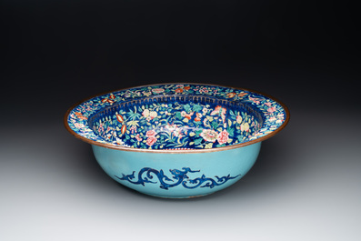 A large Chinese Canton enamel basin with figures in a landscape, Jiaqing