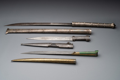 A varied collection of two daggers, two swords and forearm protection, India and Turkey, 19th C.