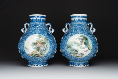 A pair of Chinese famille rose 'hu' vases with fine landscapes, Qianlong mark, Republic