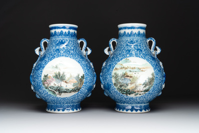A pair of Chinese famille rose 'hu' vases with fine landscapes, Qianlong mark, Republic