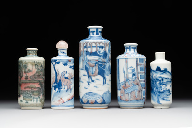 Four Chinese blue, white and copper-red snuff bottles and a blue and white snuff bottle, 19/20th C.