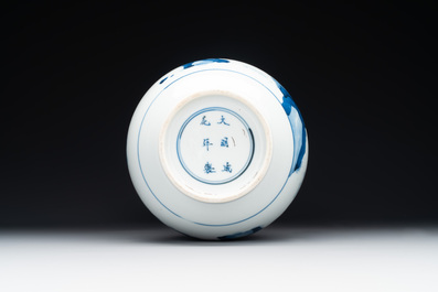 A Chinese blue and white bottle vase with court ladies and playing boys, Chenghua mark, Kangxi