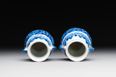 A pair of Chinese blue and white miniature 'hu' vases on wooden stands, Kangxi mark, 19th C.