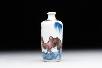 A Chinese blue, white and copper-red 'camel' snuff bottle, dragon mark, 19th C.