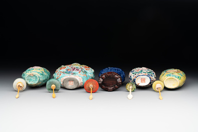 Five Chinese moulded famille rose snuff bottles, Qianlong mark, 19th C.