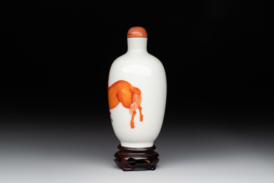 A fine Chinese iron-red and grisaille 'horse and man' snuff bottle, 19th C.