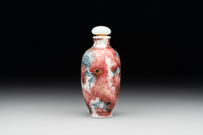 A Chinese blue, white and copper-red 'dragon' snuff bottle, Chenghua mark, 18th C.