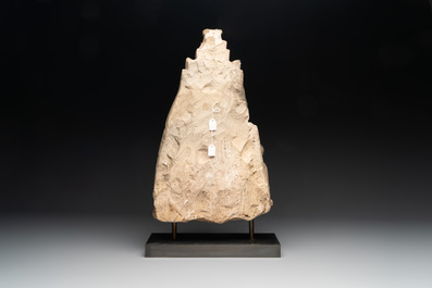 A Burmese limestone stele with Buddha and two attendants with traces of gilding, 19th C.