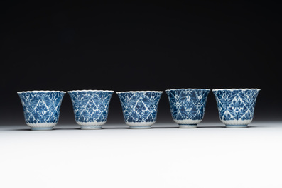 Five fine Chinese blue and white cups and saucers, 19th C.
