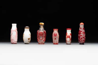 A group of six Chinese overlay glass snuff bottles, 19th C.