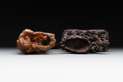 A Chinese buffalo horn carving of a landscape with a pagoda on wooden stand, Qing