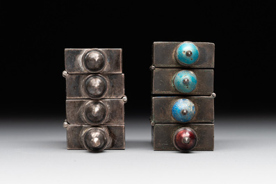 A pair of four-fold Chinese enamelled and engraved silver medicine bottles, 19th C.