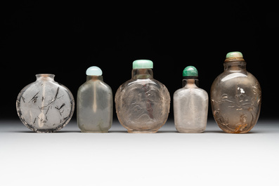 Five Chinese rock crystal and needle agate snuff bottles, Qing