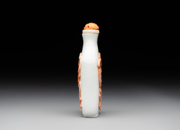 A Chinese moulded iron-red 'chilong' snuff bottle, 19th C.