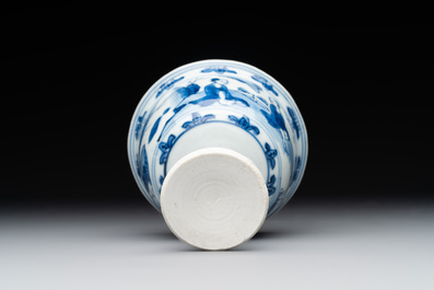 A Chinese blue and white stem cup with scholars in a landscape, Transitional period