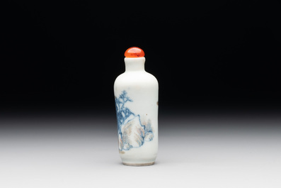 A Chinese blue, white and copper-red 'landscape' snuff bottle, 19th C.