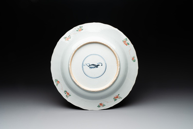 A Chinese famille verte 'river landscape' dish, artemisia leaf mark, Kangxi
